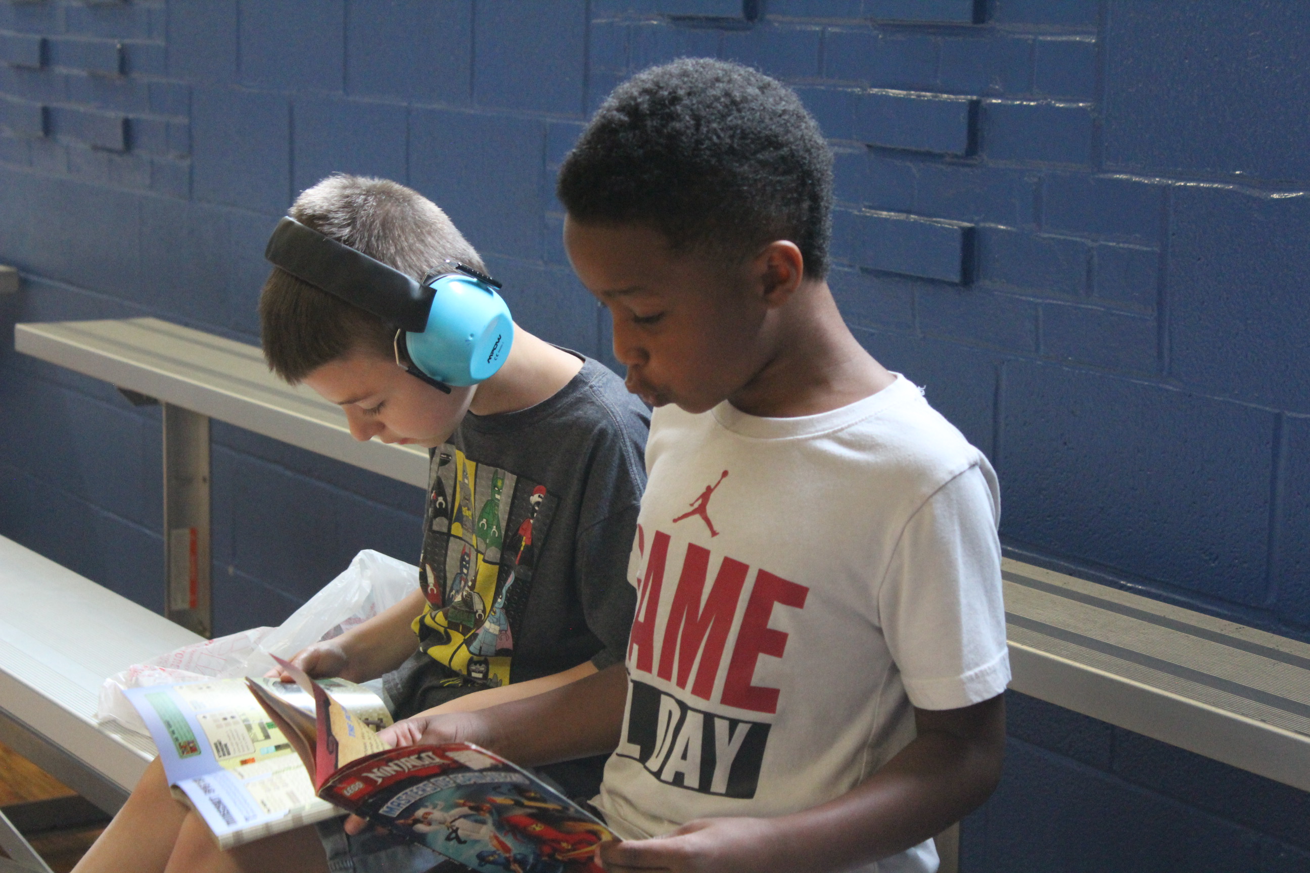 Two Children Reading Books