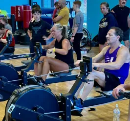 group of people on rowing machines for the Green Dry Tri