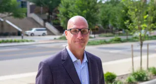 Bid with a soft smile + glasses