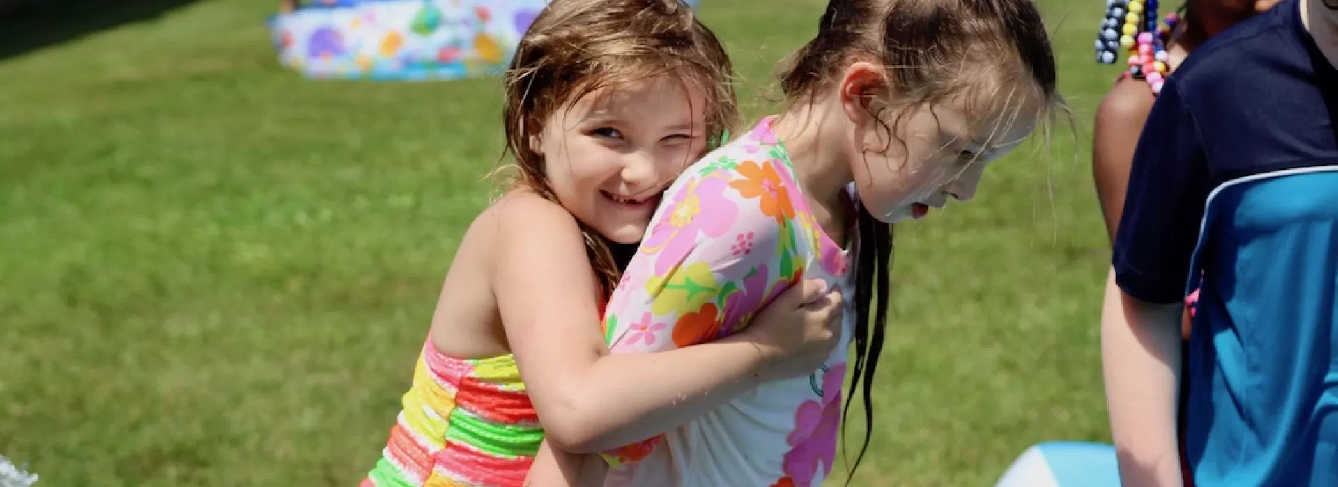 Girls piggy back