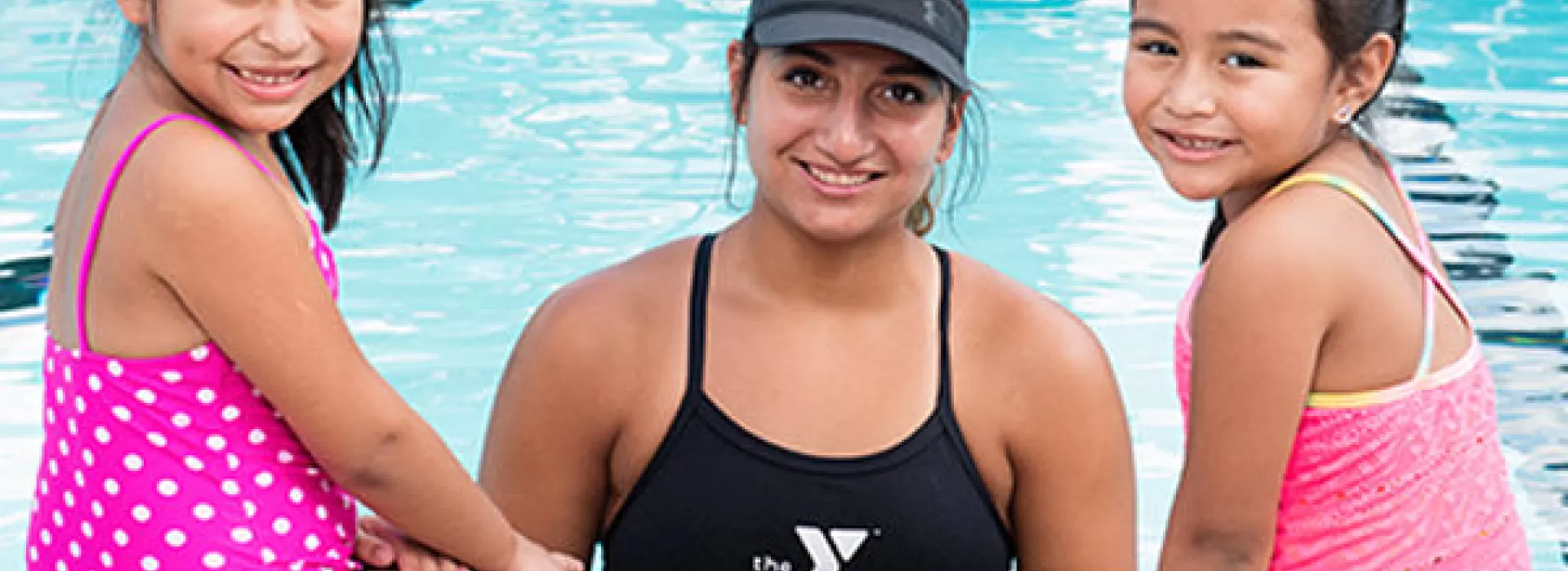 Instructor with swim girls