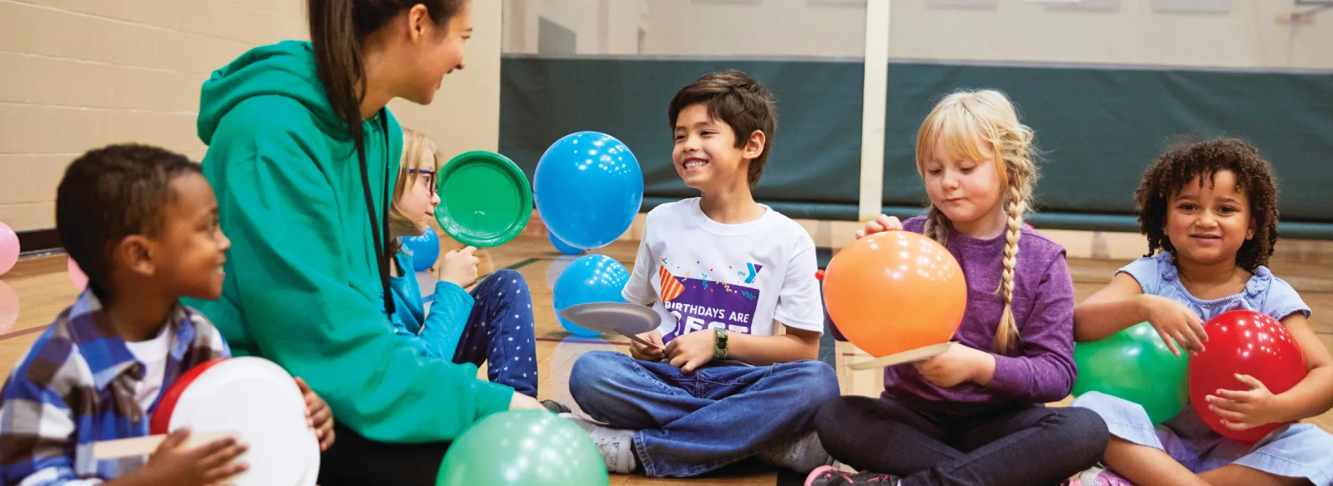 Woman playing with children